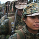 Marine recruit Christina Wauchope waits with other female recruits to fire on the rifle range during boot camp Feb. 25, 2013, at MCRD Parris Island, S.C. Female enlisted Marines have gone through recruit training at the base since 1949.
Scott Olson/Getty Images